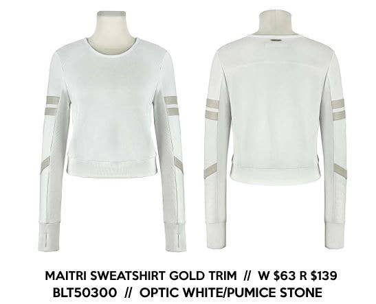 White sweatshirt with gold trim on mannequins against a white background