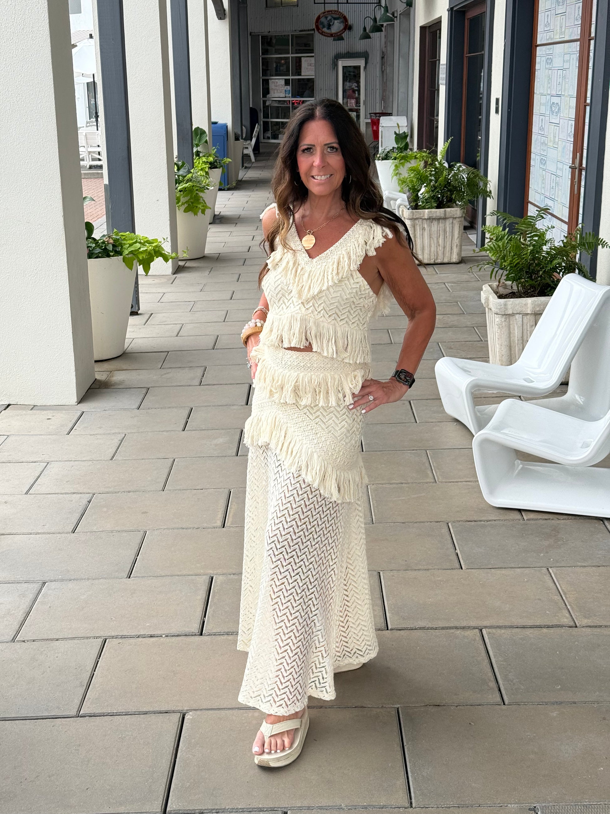 woman modeling cream crochet set