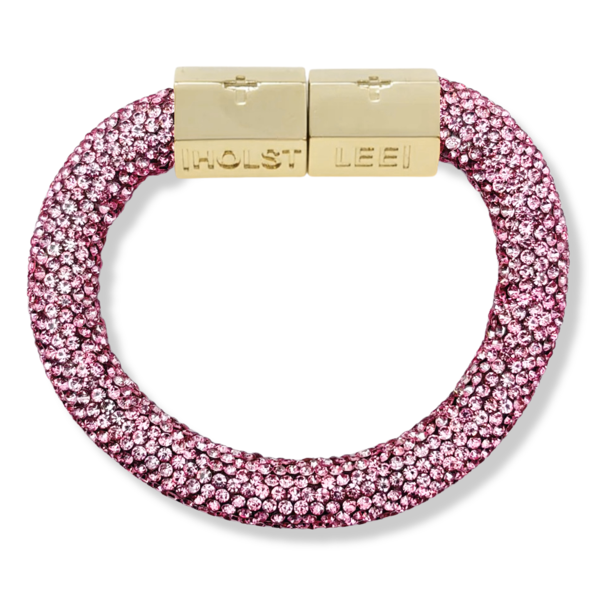 Pink Holst + Lee Sparkle Bracelet with crystal threading and an engraved gold magnetic clasp on a white background.