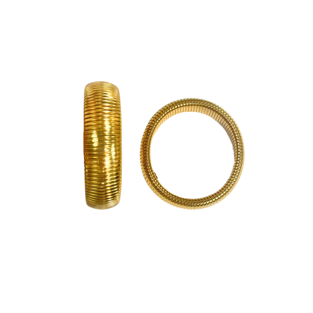 Two gold bangles on a white background