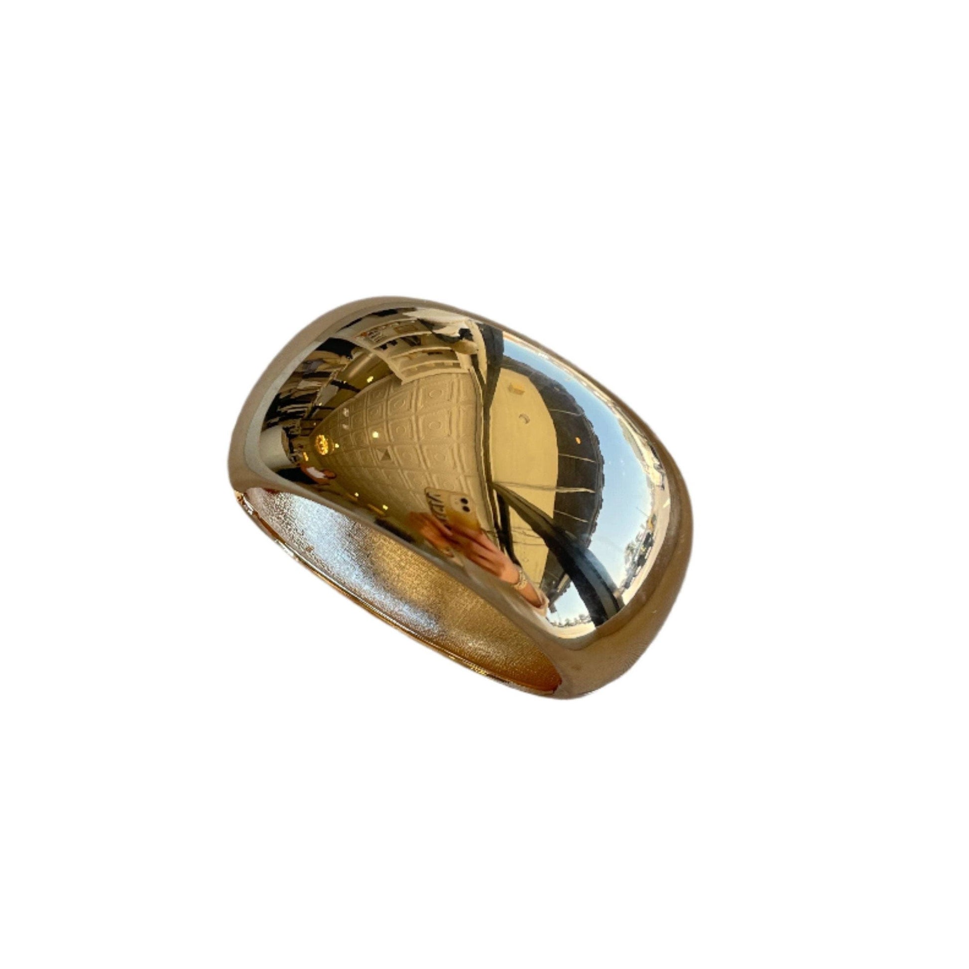 Gold ring on a white background