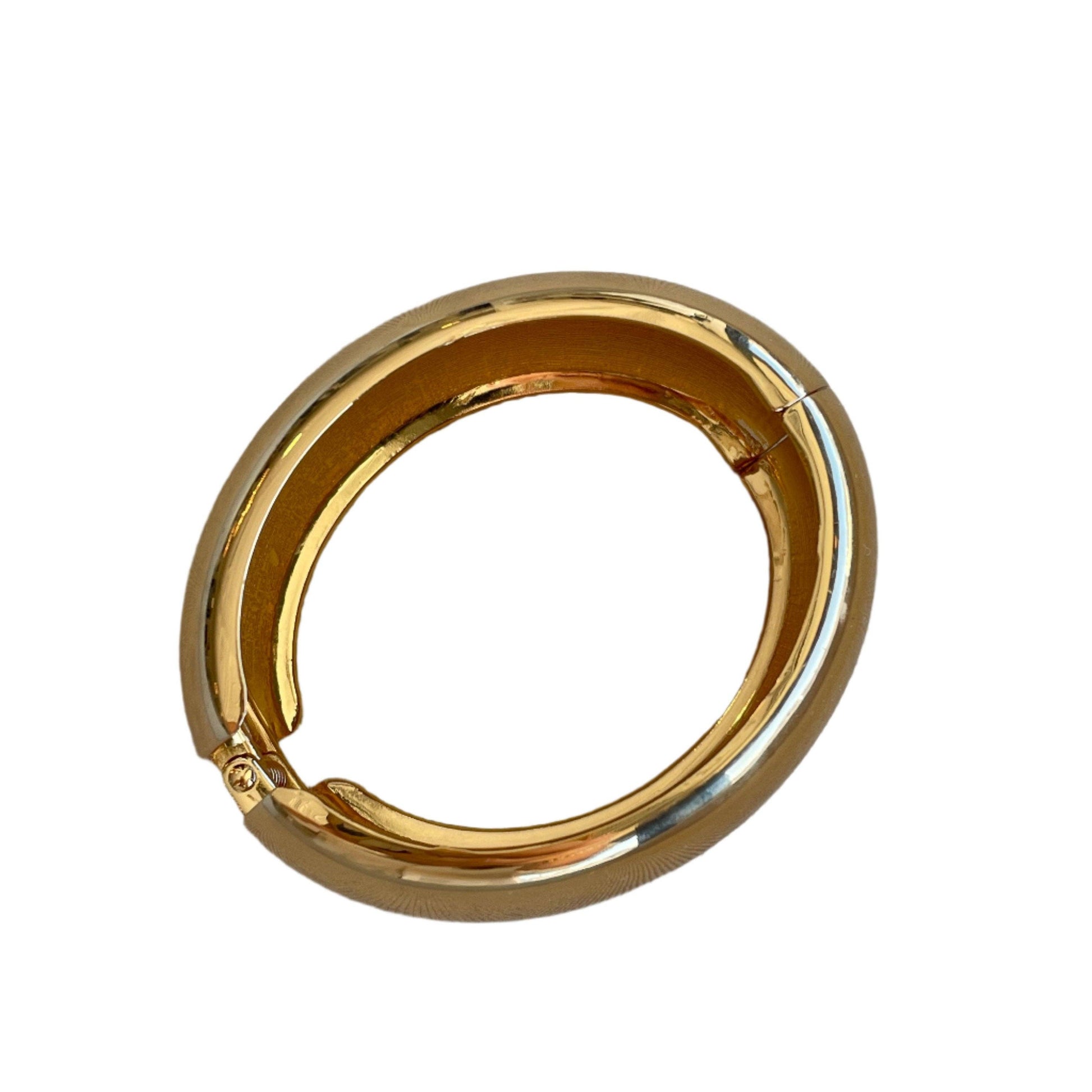 Gold ring with a white background